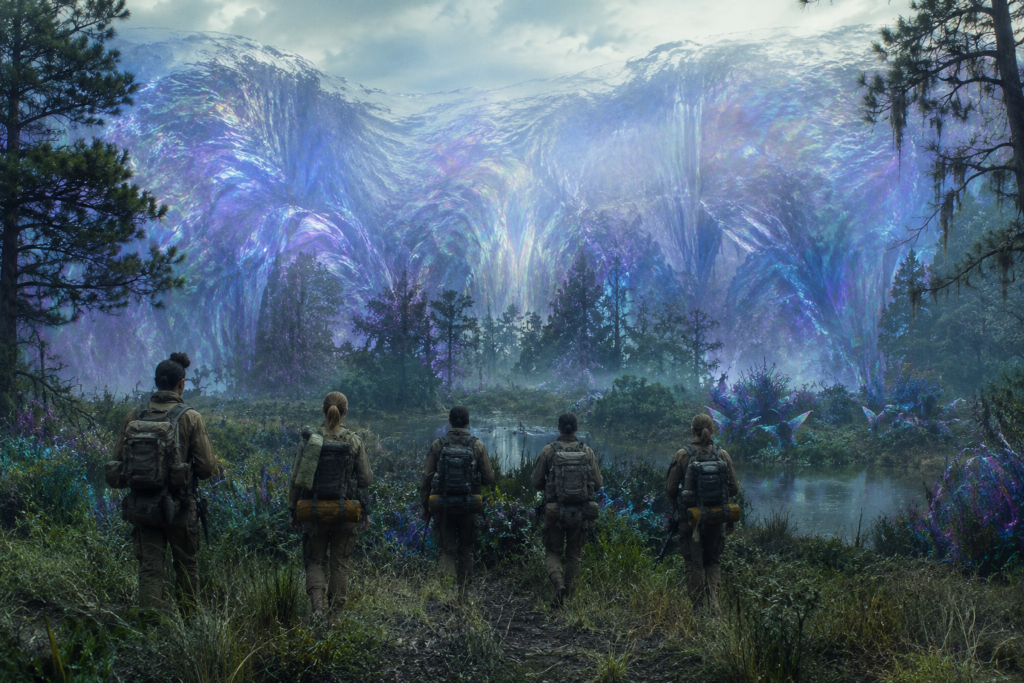 surreal sci fi landscape inspired by Annihilation with explorers approaching a shimmering alien phenomenon